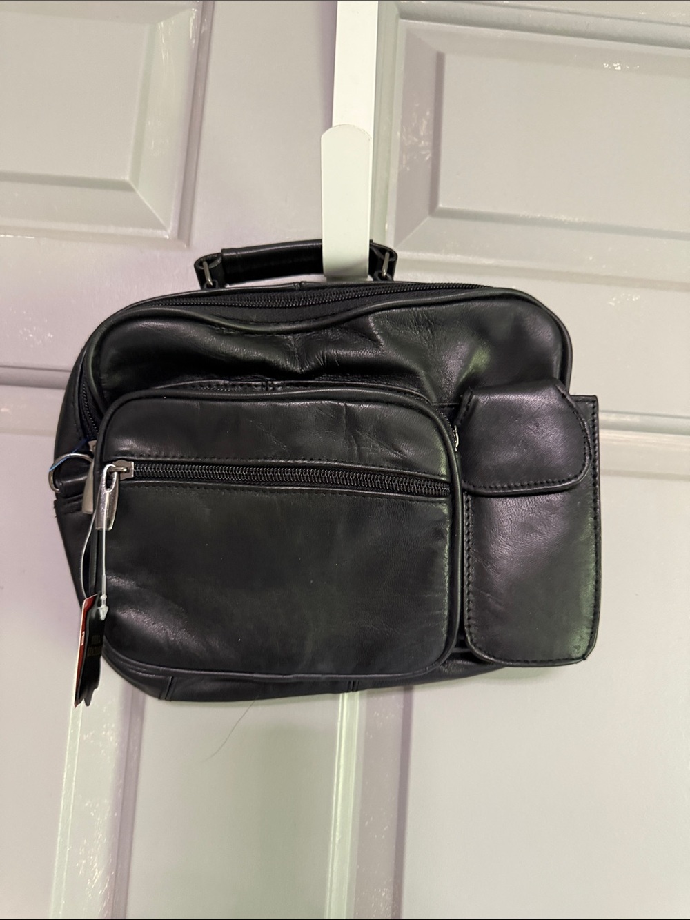 Black Leather Messenger Bag with Multiple Front Pockets